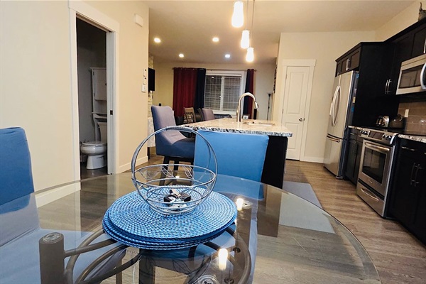 Dining room off the kitchen, seating for 4. 