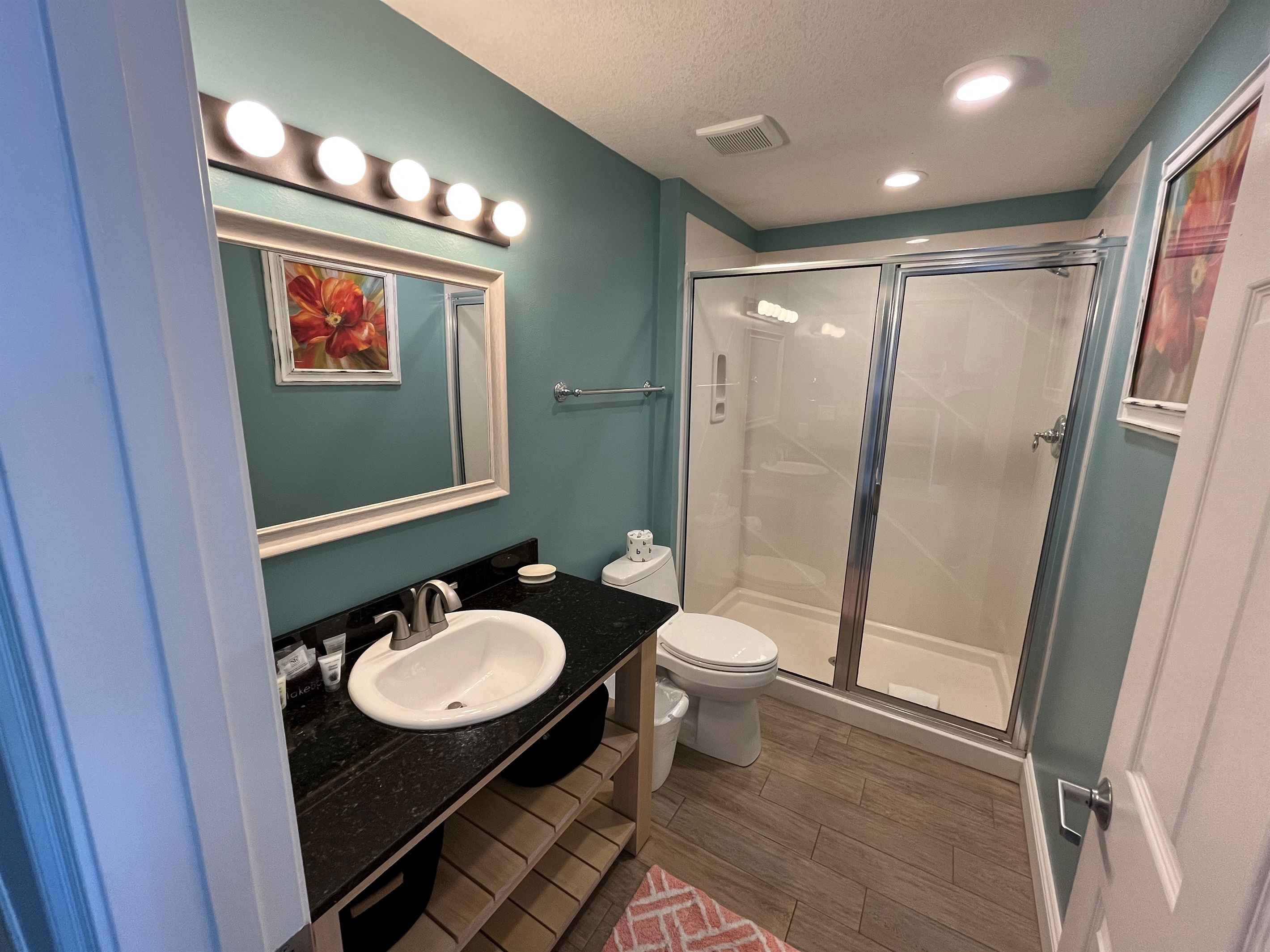 Comfortable guest bedroom designed for a restful night's sleep after a day at the beach.