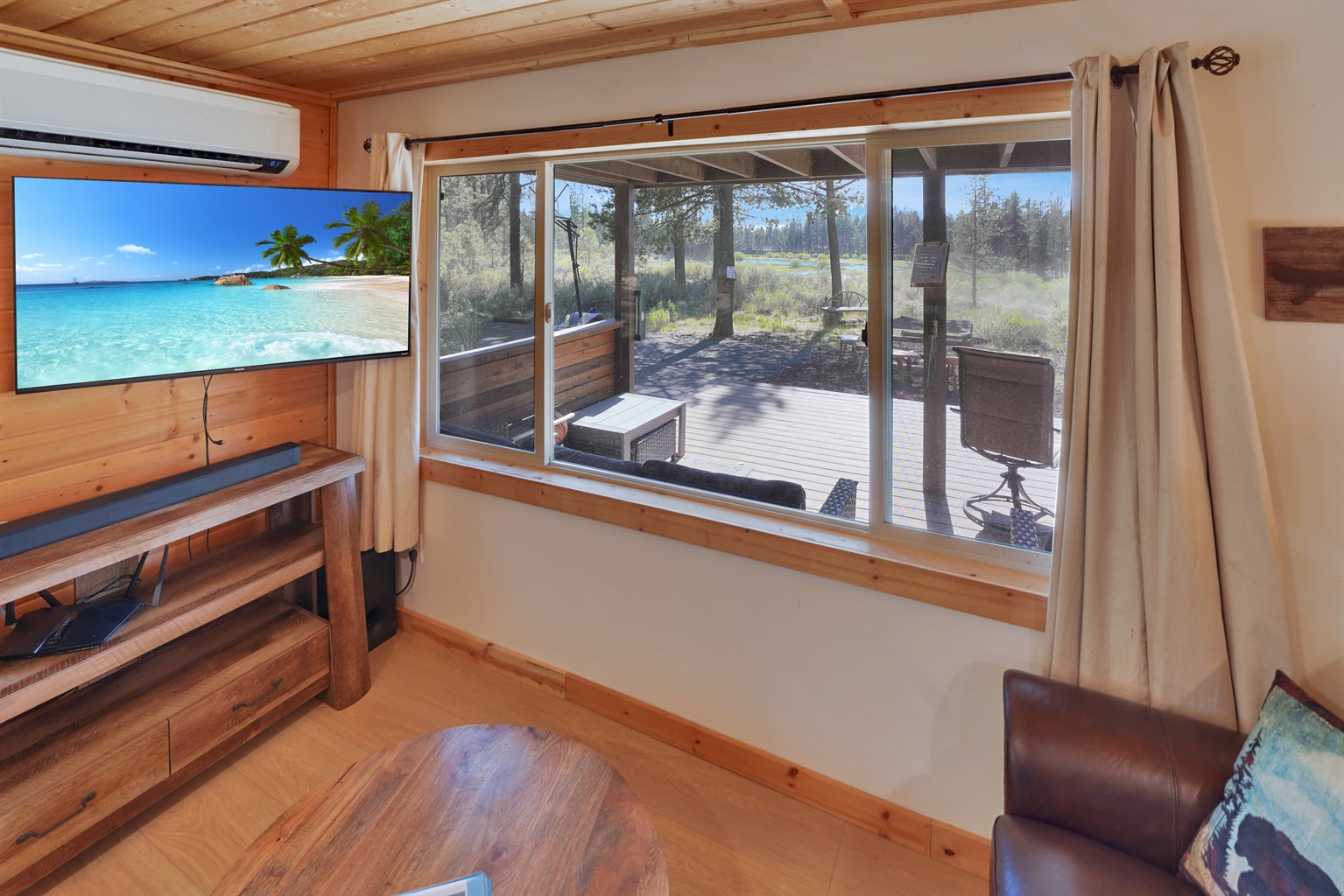 Relax indoors while taking in river and forest views