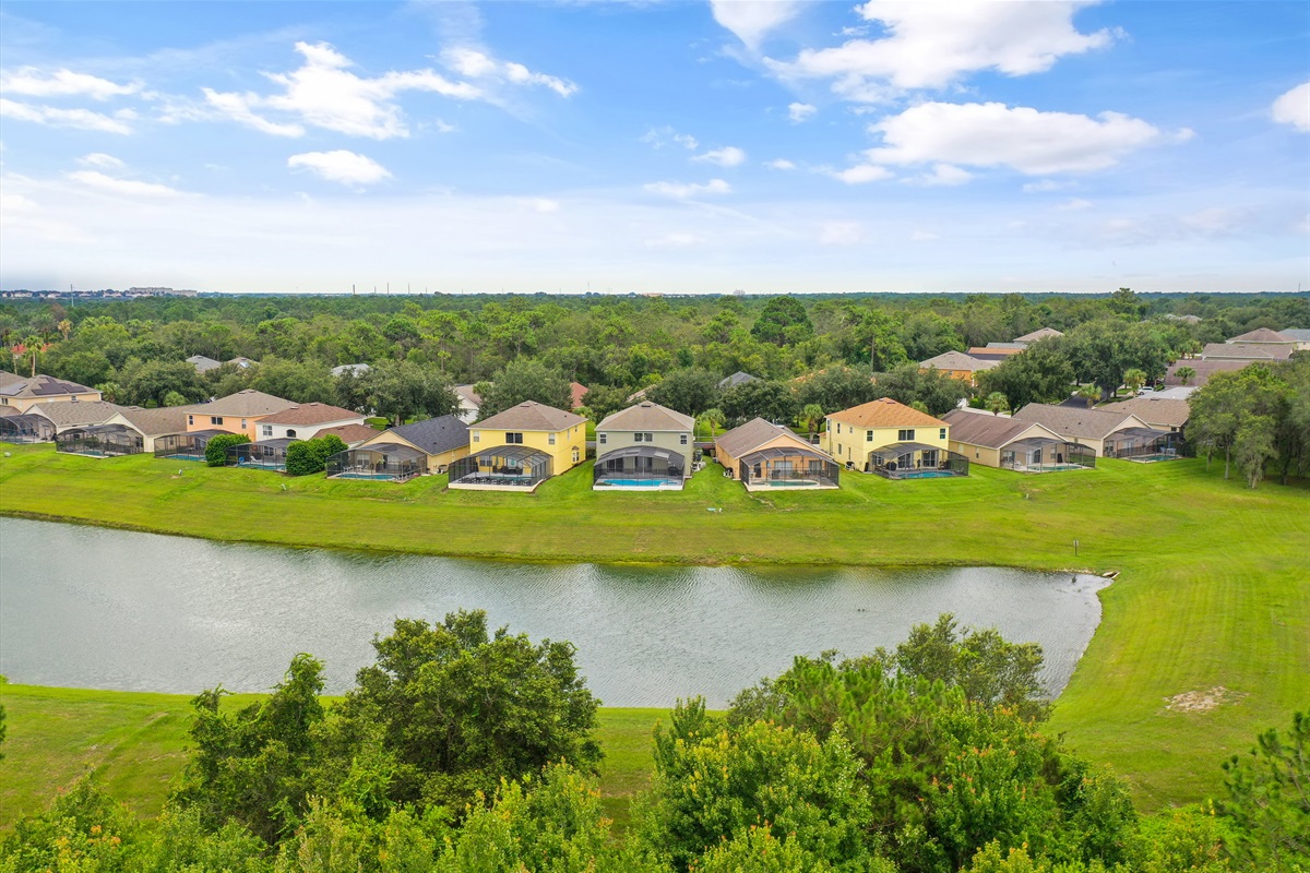 Pool area overlooks a community pond