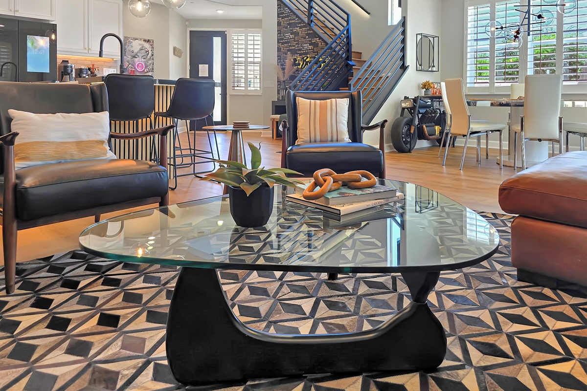 Luxurious living and dining with high-end, designer furnishings.