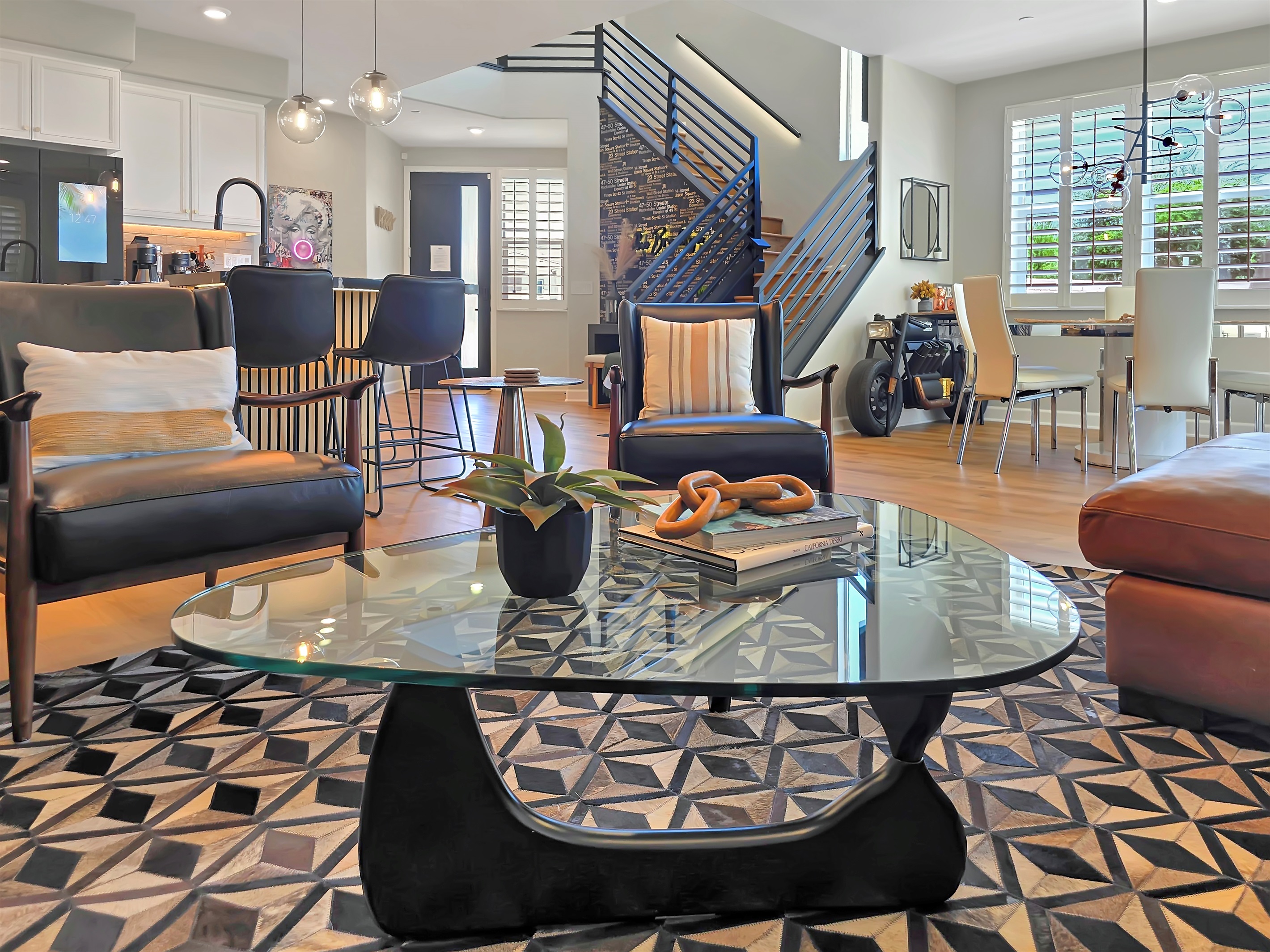 Luxurious living and dining with high-end, designer furnishings.