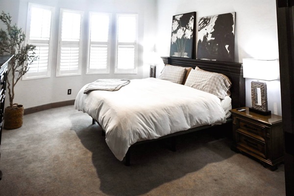 One of two dual master suites with split king adjustable beds