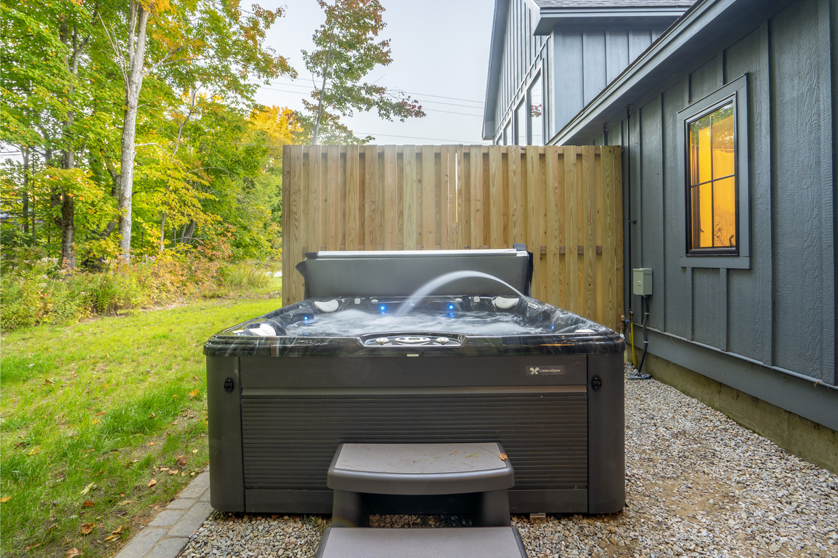 Relax under the open sky in our lovely new hot tub.
