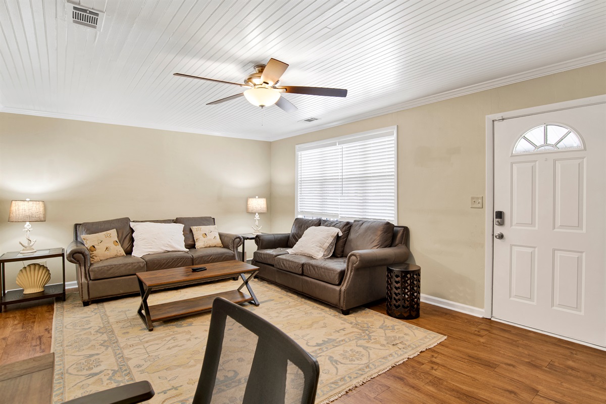 Enjoy a favorite movie or sports event in the living area