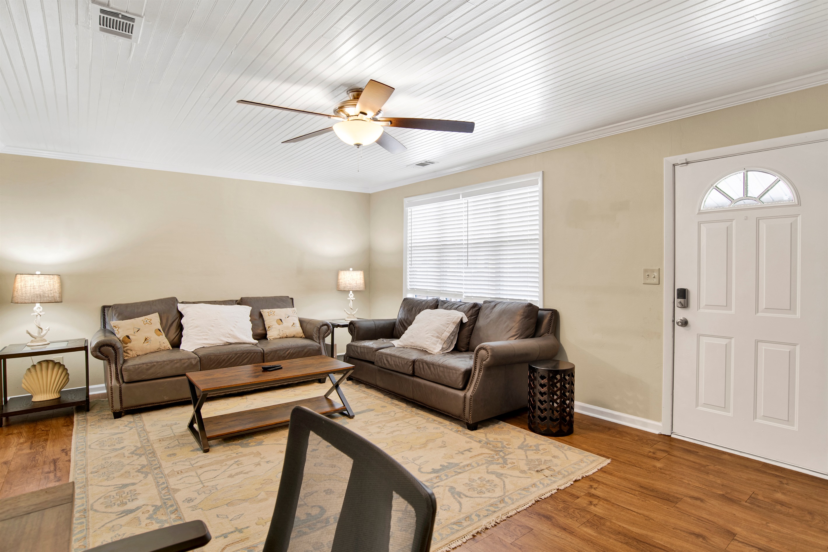 Enjoy a favorite movie or sports event in the living area