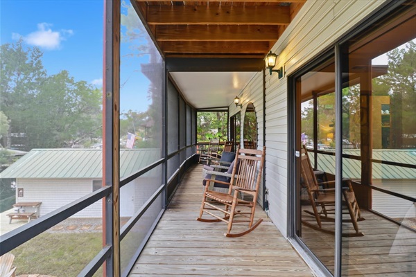 40 foot screened balcony with plenty of seating.