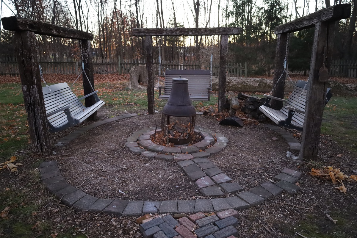 fire pit and swings