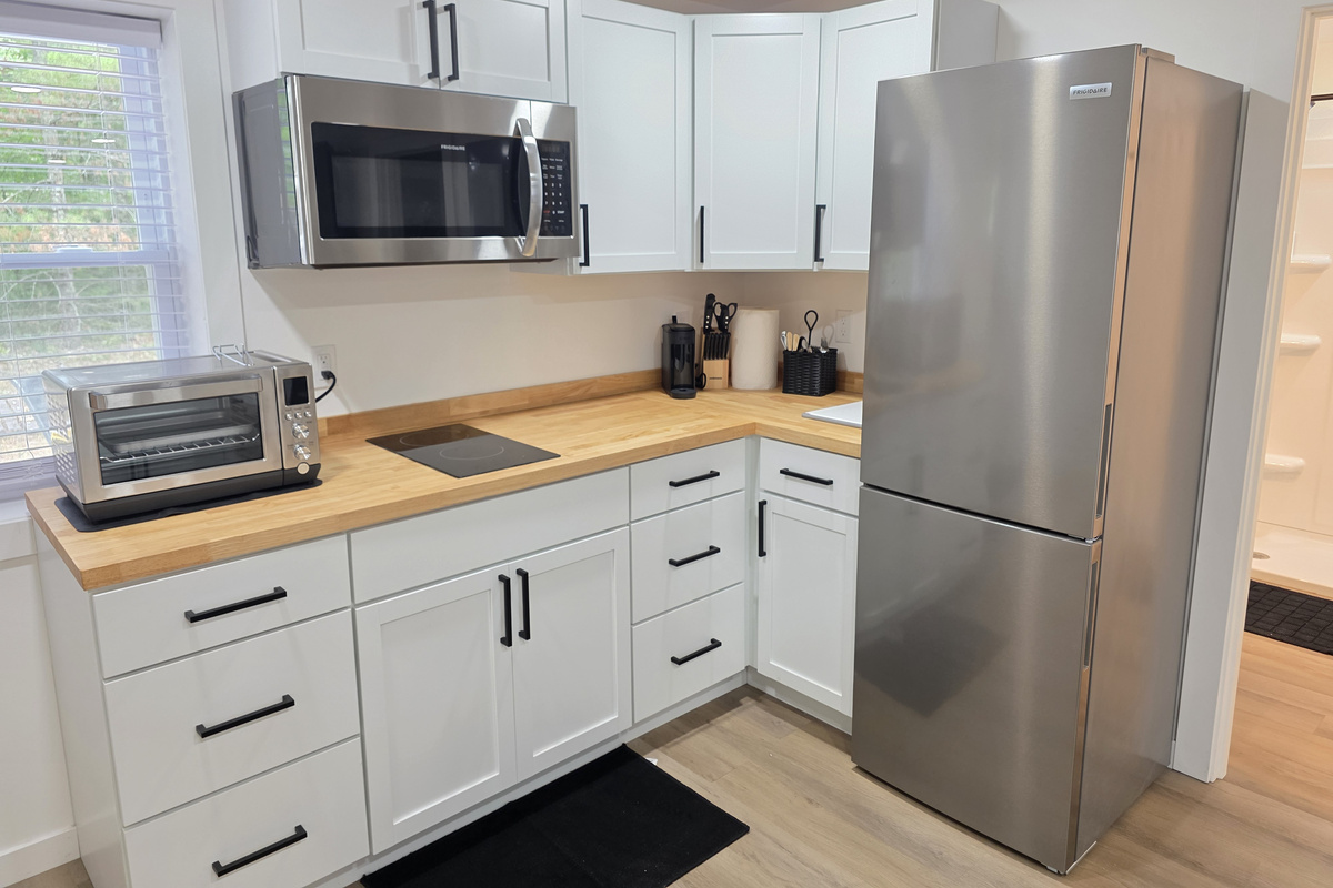 Kitchen with stainless steel appliances and toaster oven