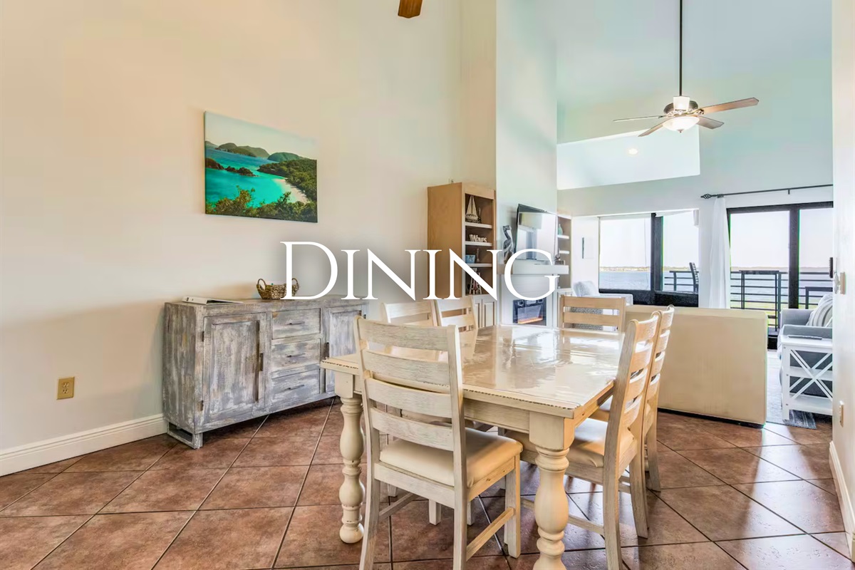 Gather around the dining table for meals, games, or planning your next beach adventure.