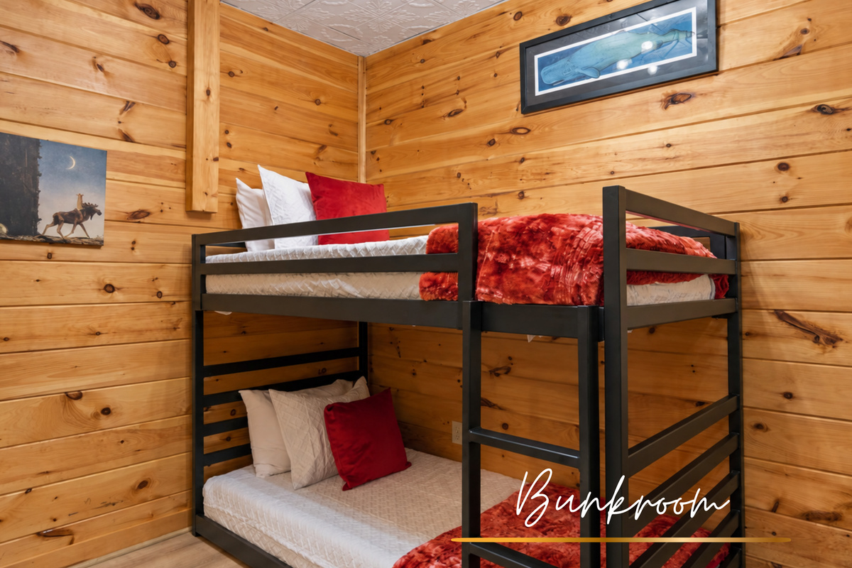 Cozy twin bunks with rustic charm, because mountain getaways are even sweeter with a touch of fun.