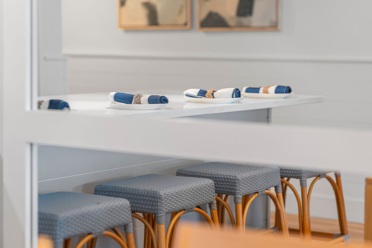 The four bar stools at the counter provide a comfortable spot for a quick breakfast before heading out to the sand.