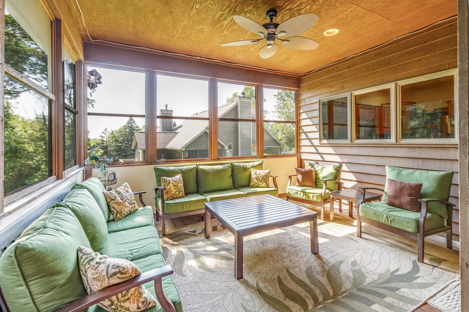 Screened porch for morning coffee or afternoon happy hours