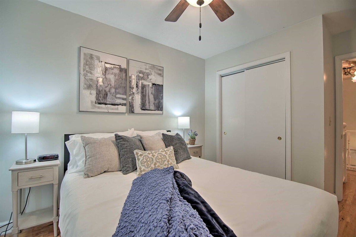 3Bd Unit: The second upstairs bedroom has plenty of pillows and throws for your comfort.