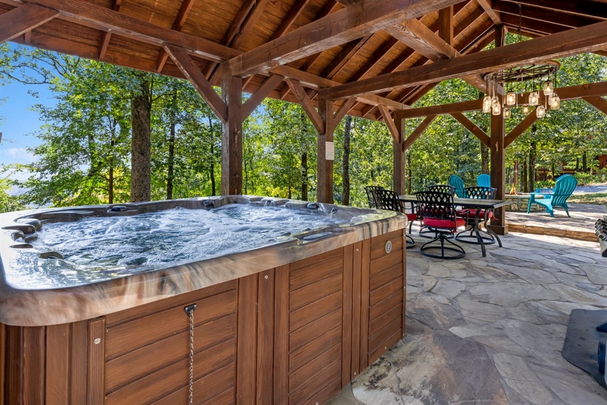 Soak under the stars in your private hot tub, steps from the cabin.
