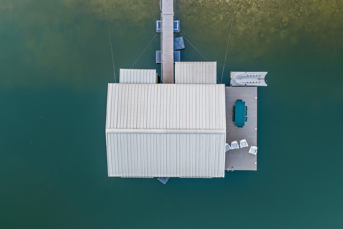 Private covered boat dock — ideal for lake days, fishing, and waterfront fun.