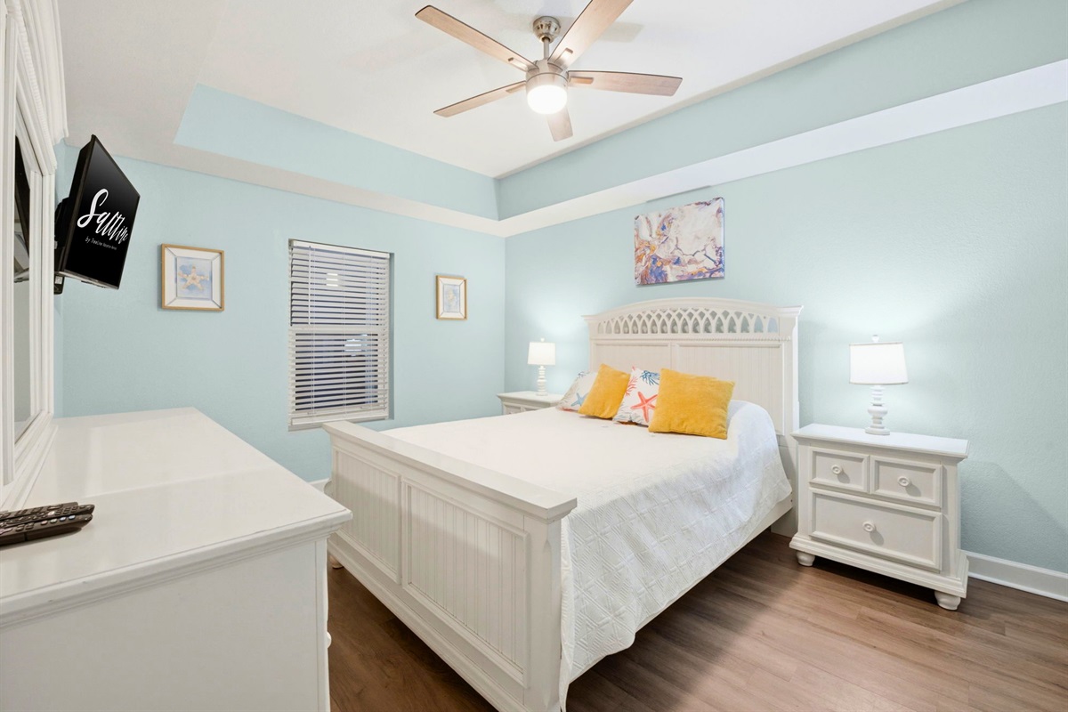 Relax in this spacious primary bedroom complete with soft tones and plenty of room to unwind.