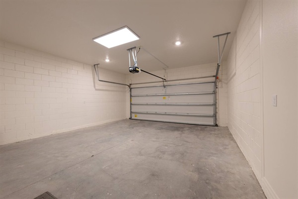 Two car garage can be used for storage, trailers and extra cars. 