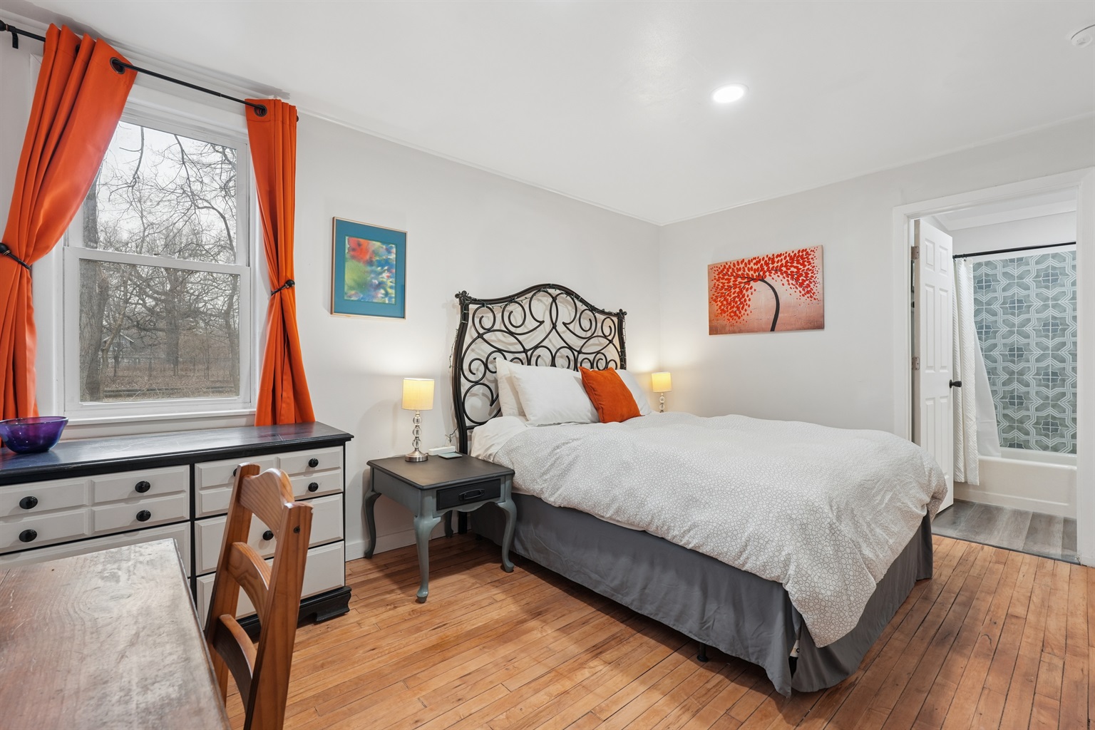 Enjoy the desk and dresser in the queen bedroom provided for your convenience. There's a closet as well.