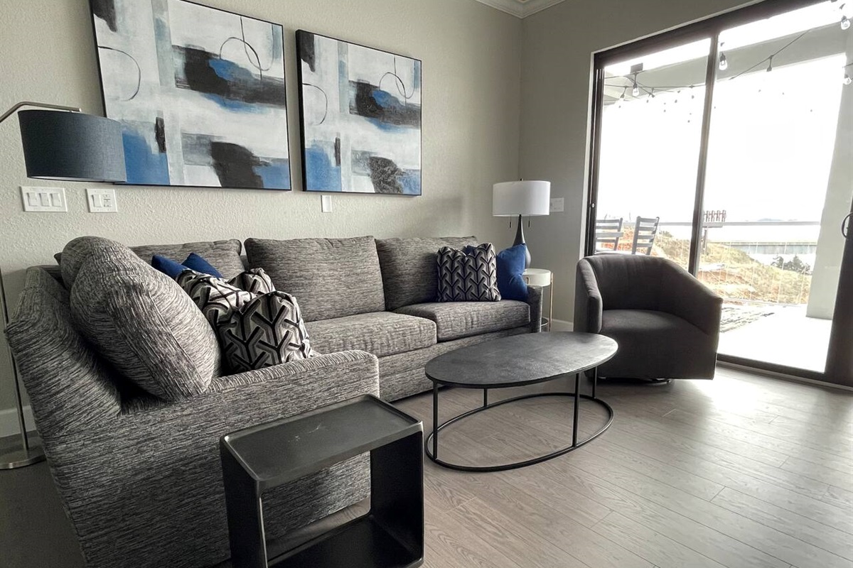 Great views of the lake and the tall ceilings from the top floor living room. 