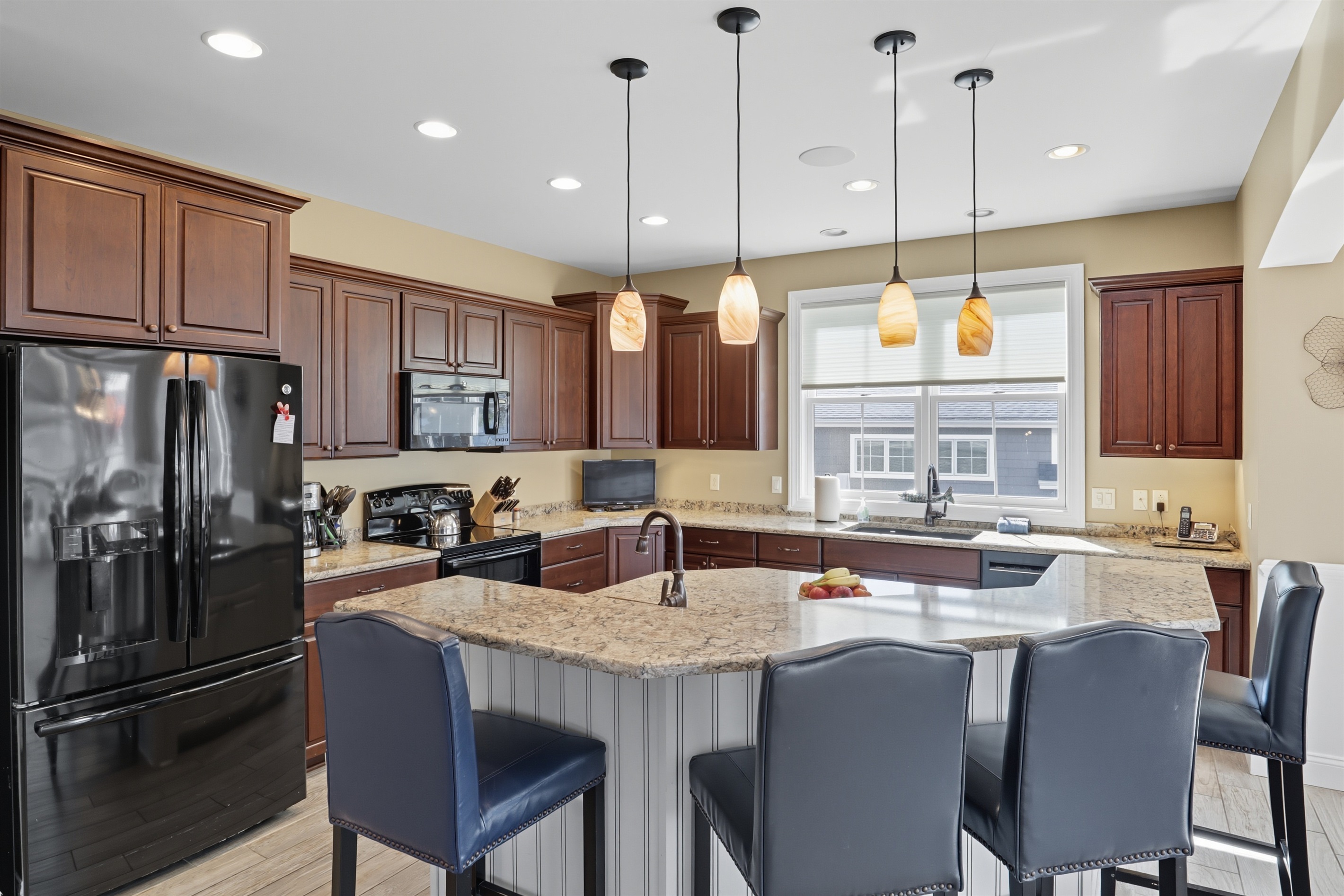 Gourmet kitchen with island seating