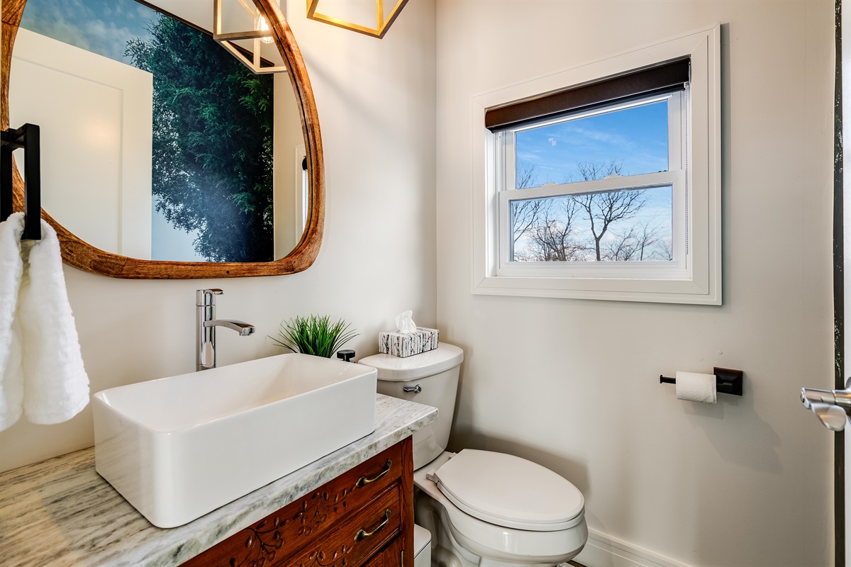 Sleek Half Bathroom Counter with Wood Accents