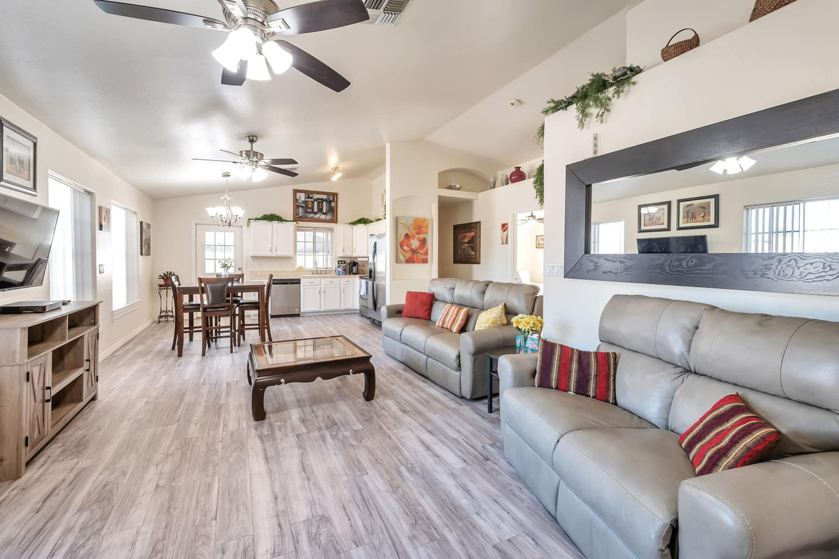 Kick back in a huge open-plan living room — sink into the leather sofas, put on a movie, and let the whole crew spread out