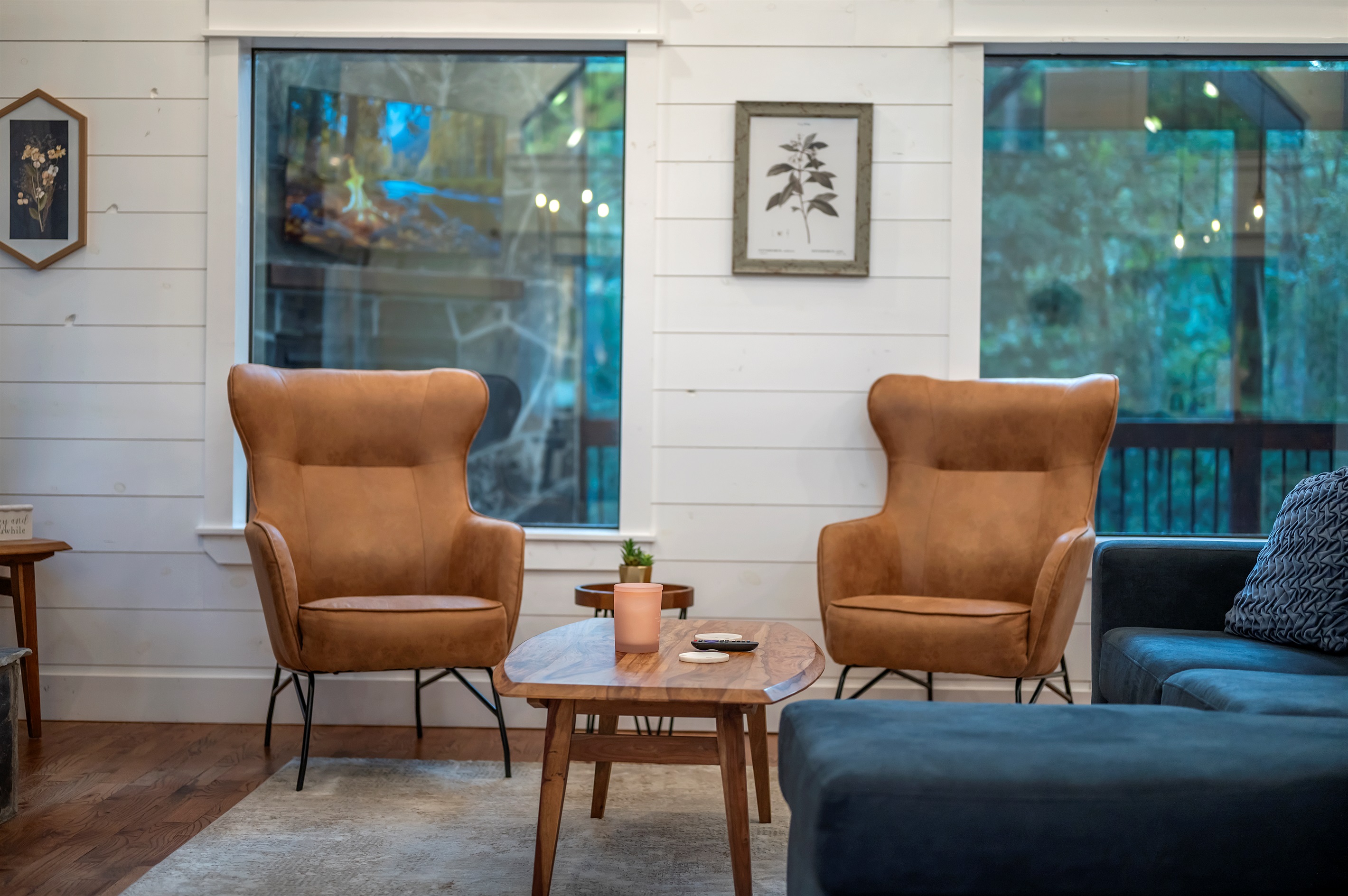 A great spot to sip your morning coffee or afternoon cocktail.  This seating area is in your living room adjacent to your record player & couch.