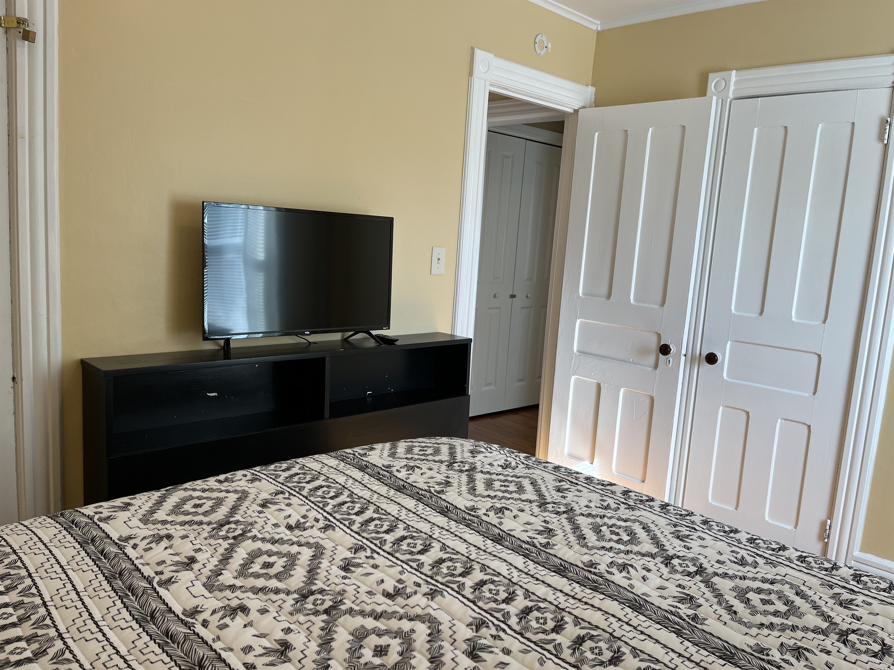 Cooperstown Cottage queen bedroom #2 with smart TV.