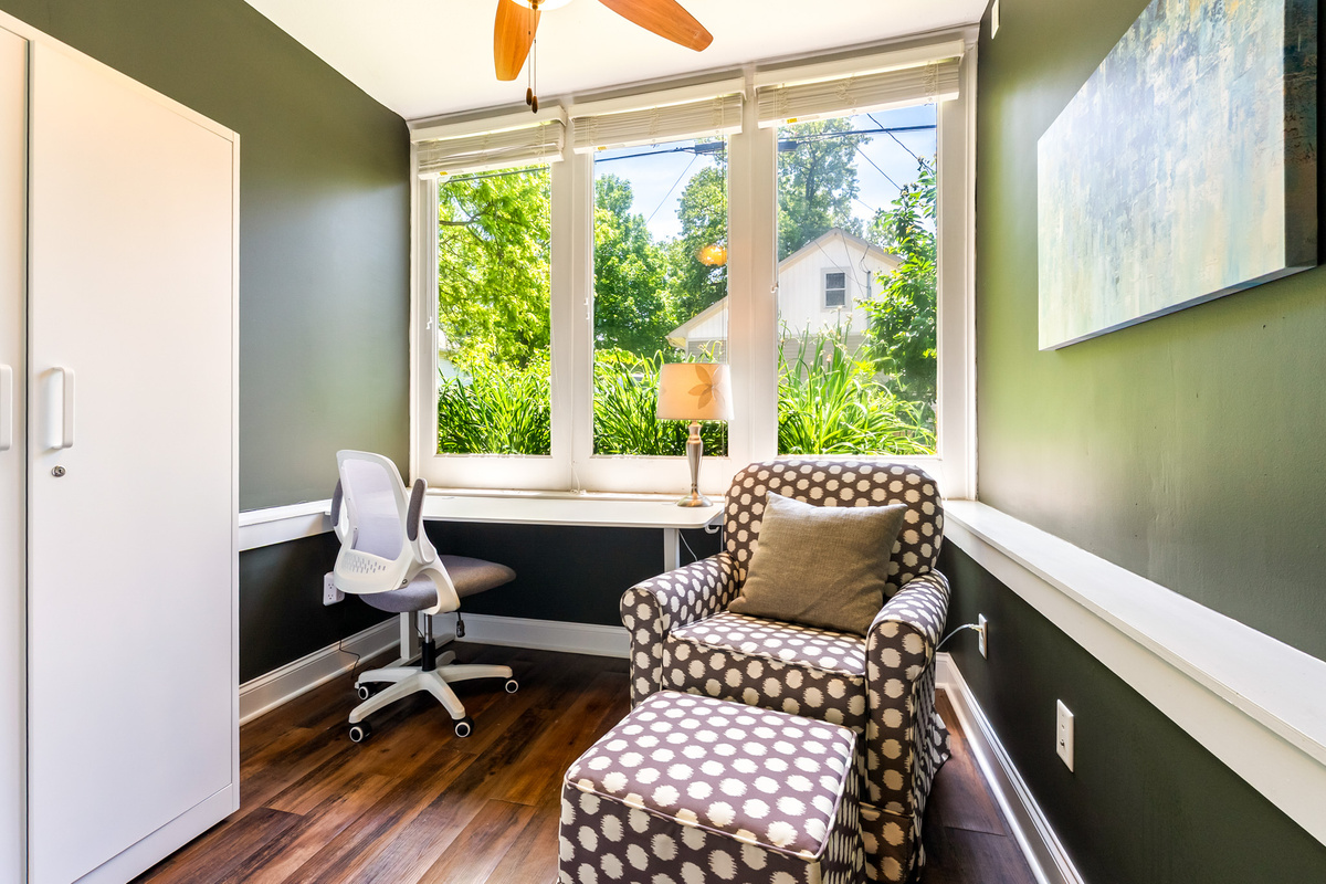 Log in with ease. The Garden Level Suite features a dedicated workspace tucked into a bright sunroom, complete with a spacious desk, comfortable chair, and fast Wi-Fi—perfect for remote work or study.