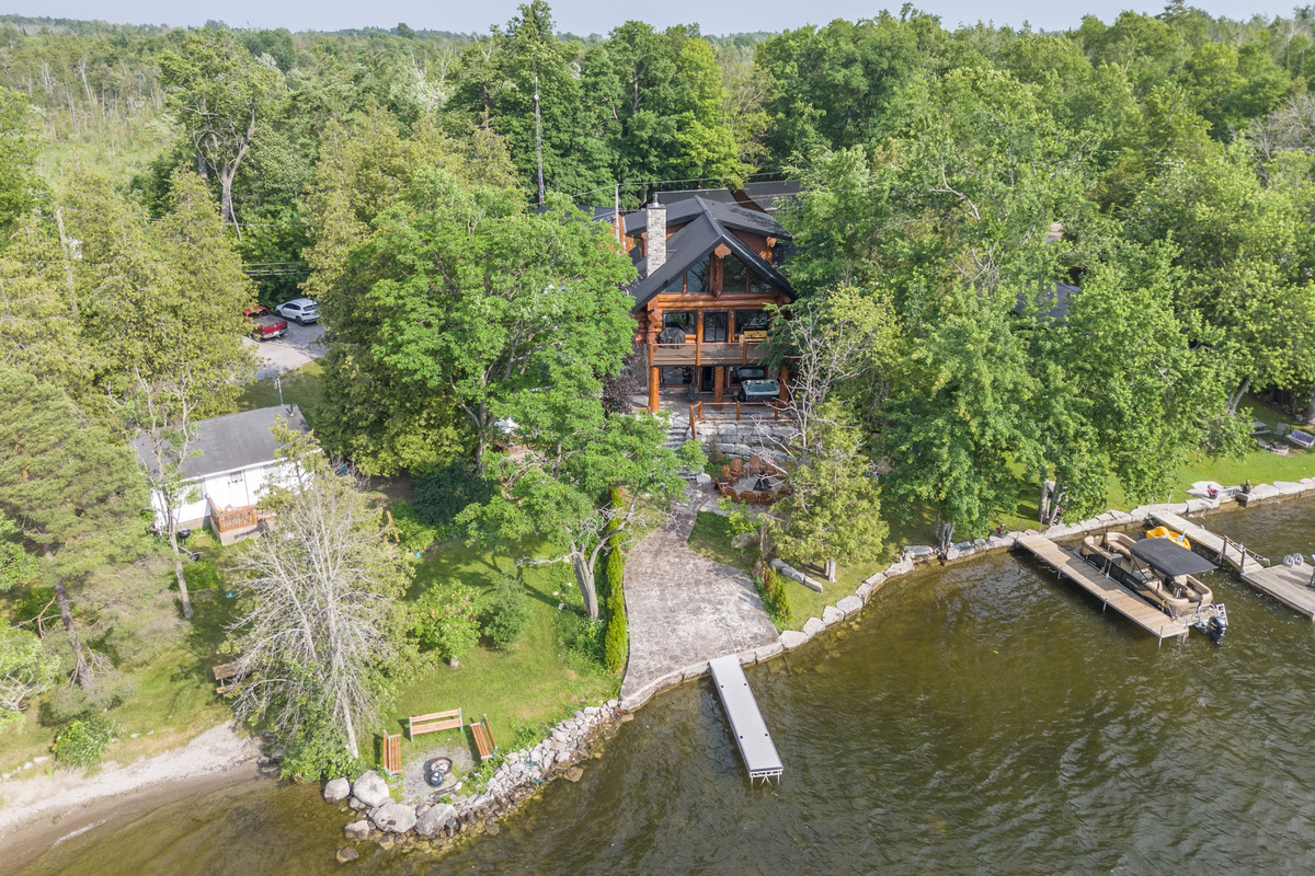 Aerial waterfront view of Bear Lodge and the surrounding grounds