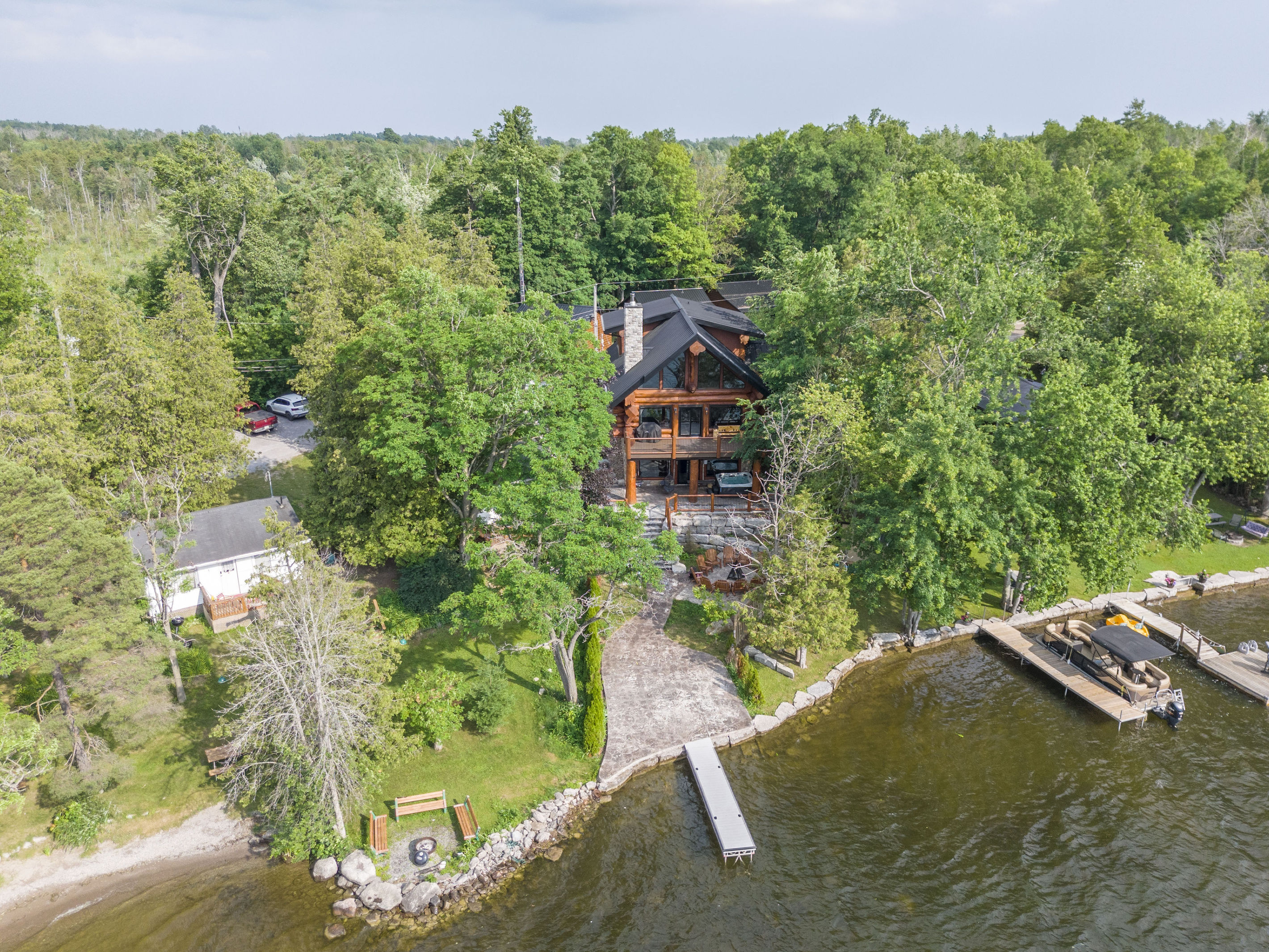 Aerial waterfront view of Bear Lodge and the surrounding grounds