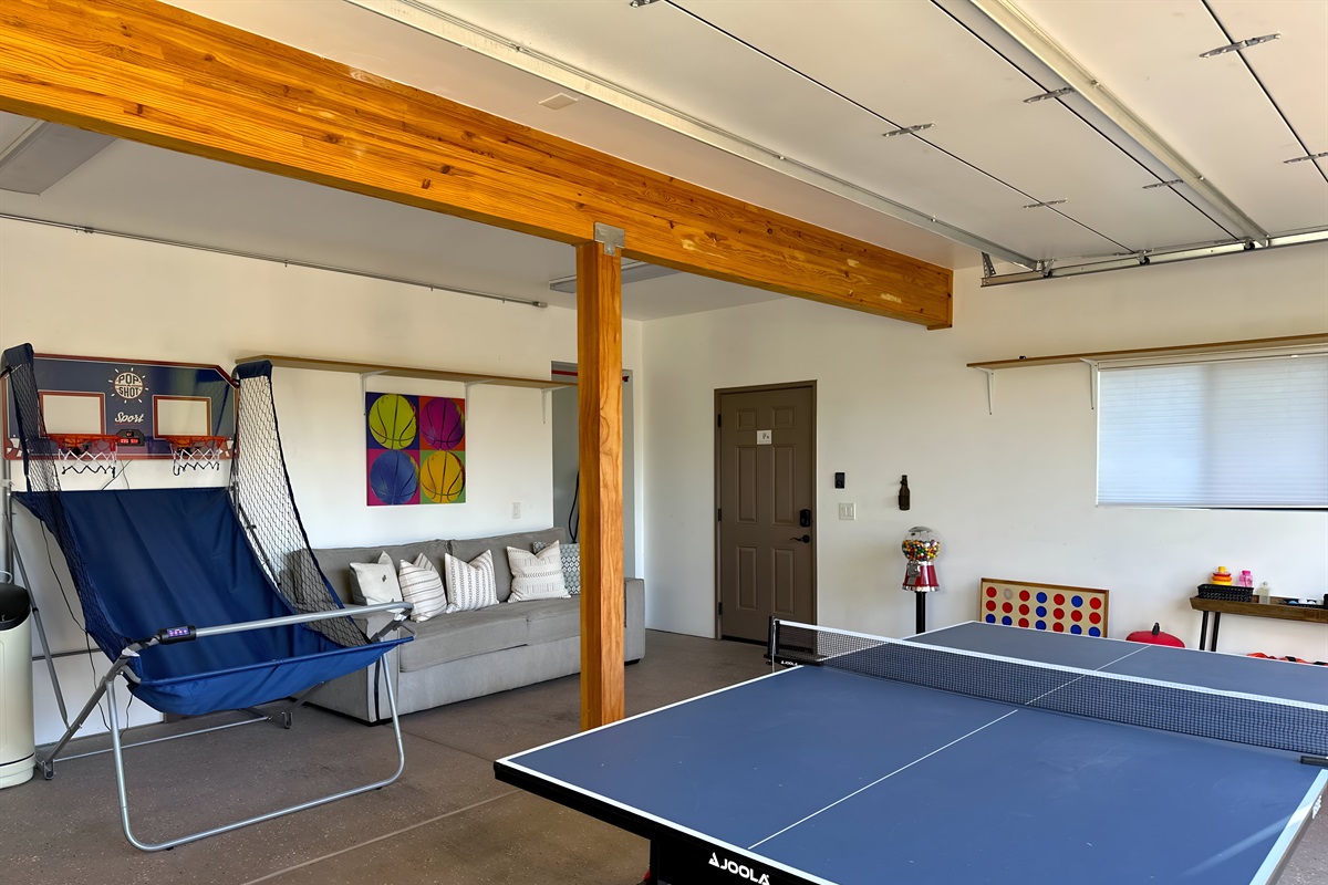 {Garage} Charge up your EV or enjoy the games for all ages.