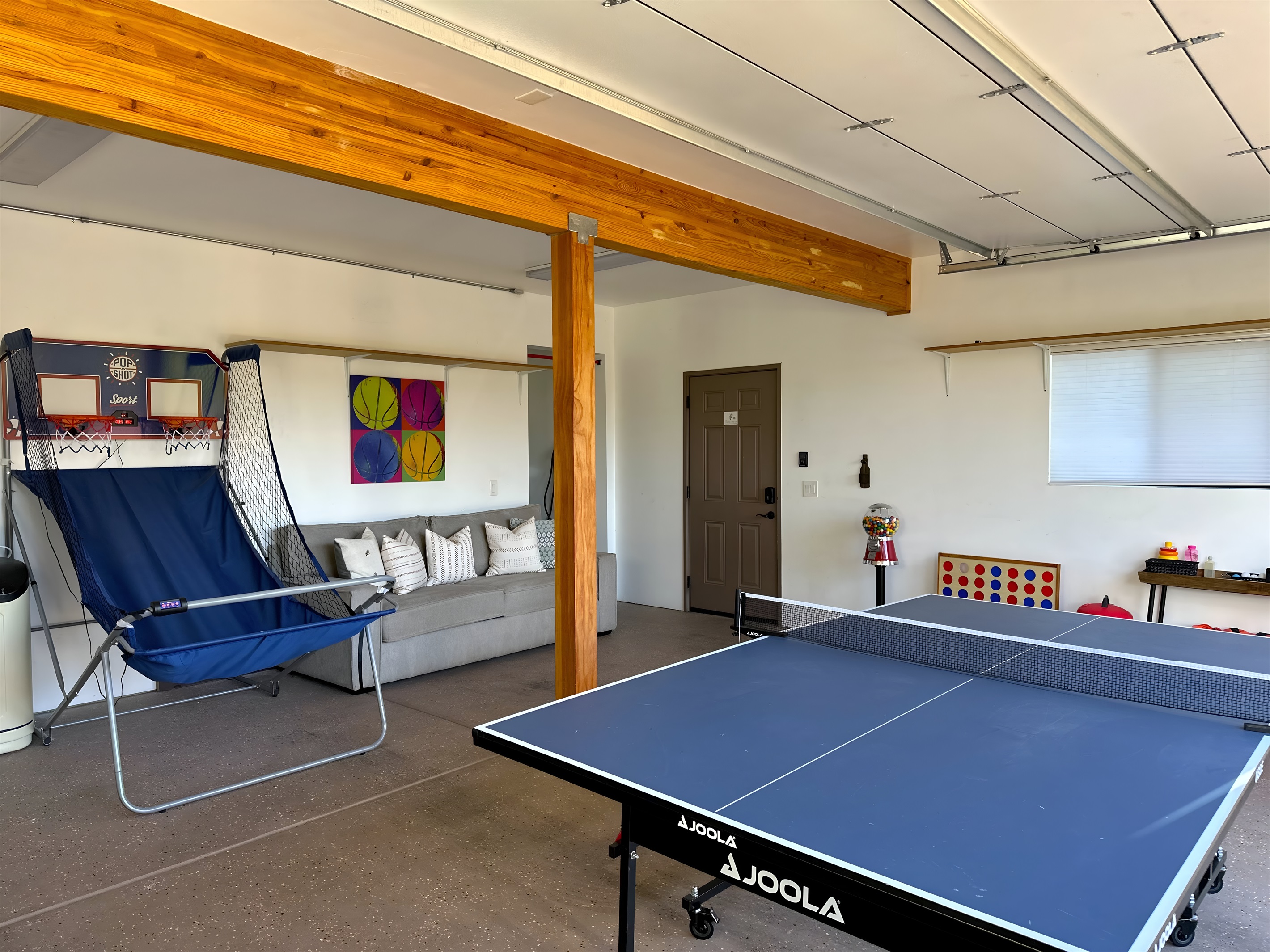 {Garage} Charge up your EV or enjoy the games for all ages.