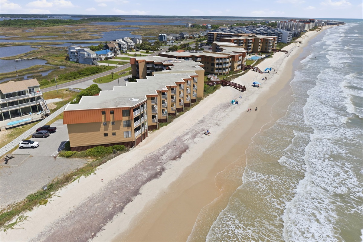 Breathtaking aerial view of Topsail Dunes stretching along the beautiful oceanfront shoreline