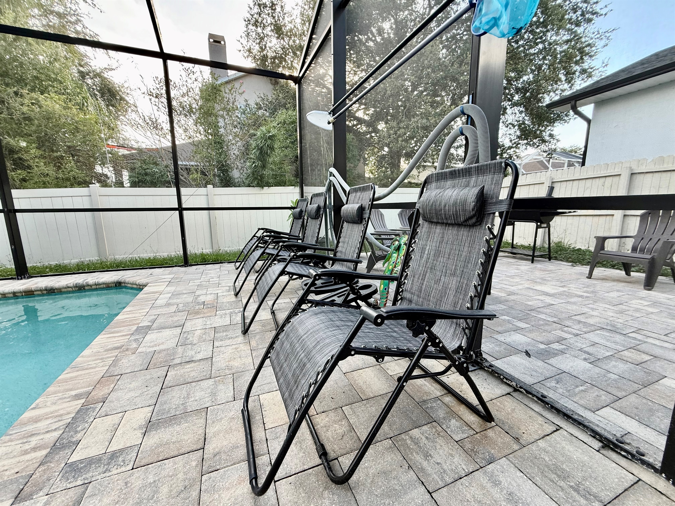 Stretch out and soak up the sun on multiple reclining loungers or gather around the shaded seating area for poolside conversations, card games, or reading a good book.