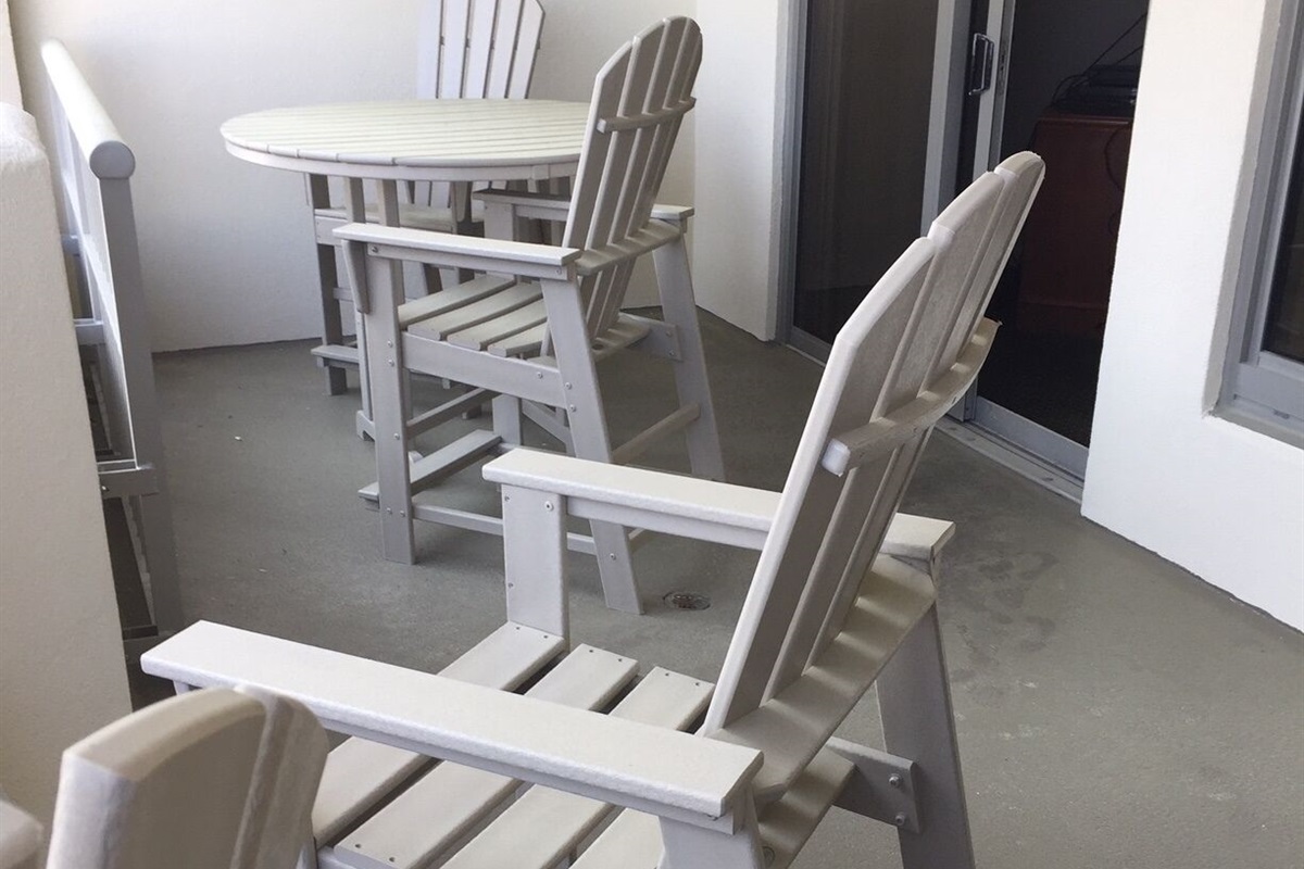 Counter height (for better views) Adirondack chairs and table