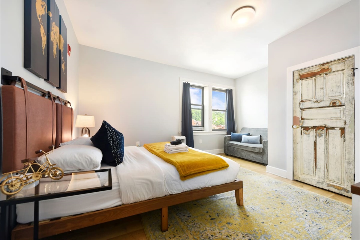 Spacious and elegant queen-sized bedroom with designed for comfort and style.