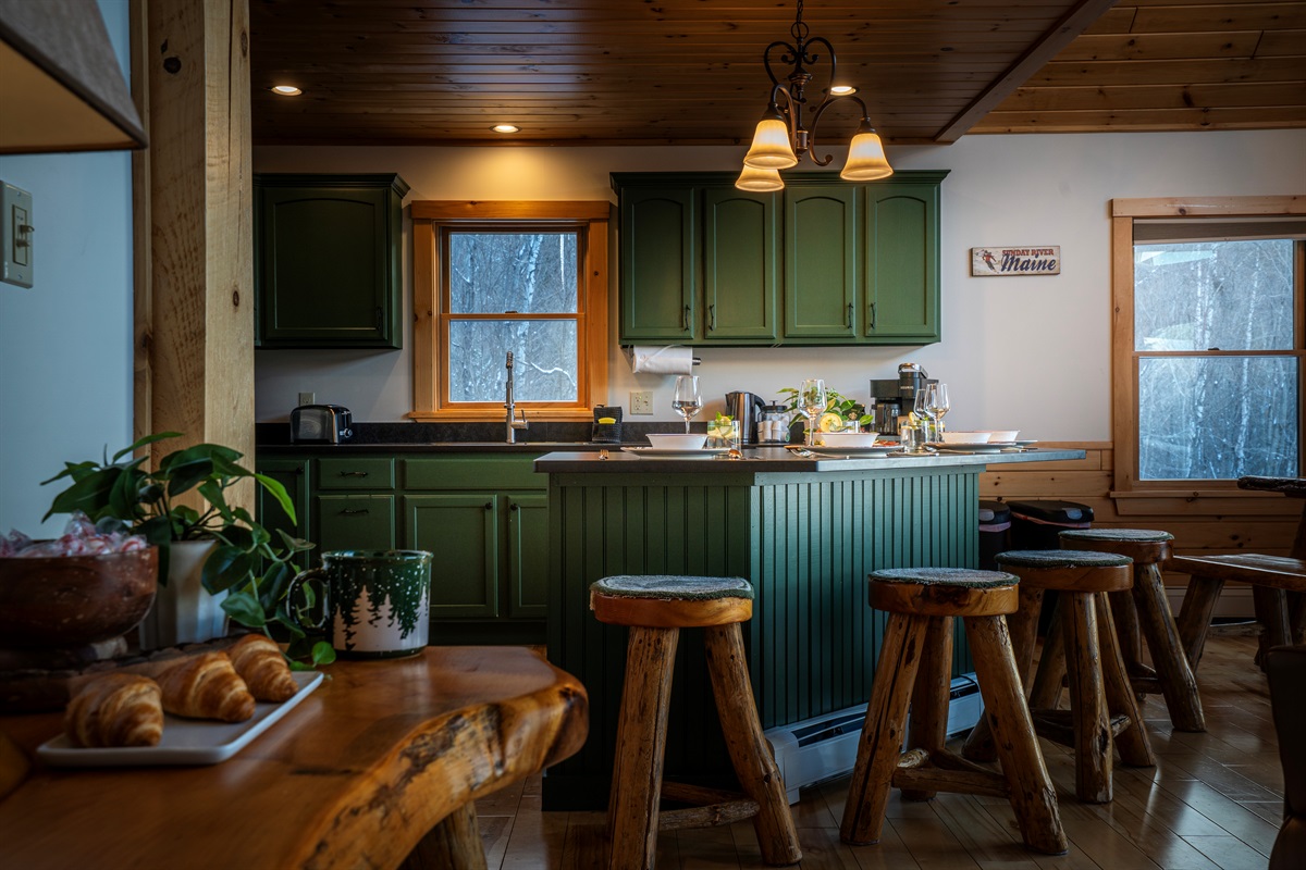 A modern kitchen with a center island, ideal for romantic dinners or casual meals.