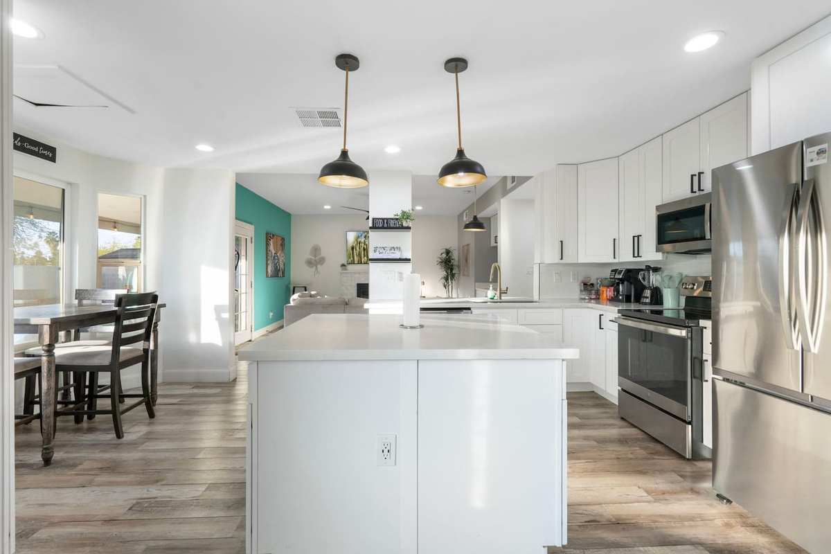 Gather around the island or flow into the dining space just steps away.