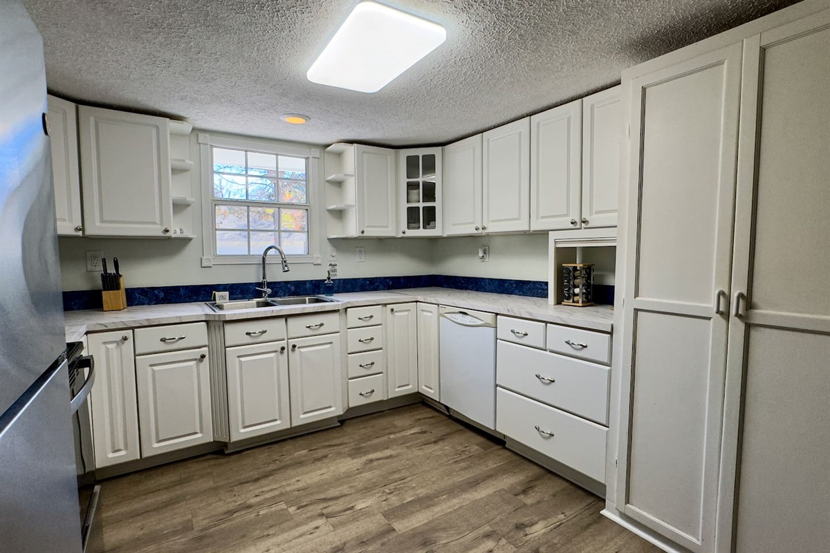 Start your day here—coffee brewing, sunlight streaming, and everything within reach.