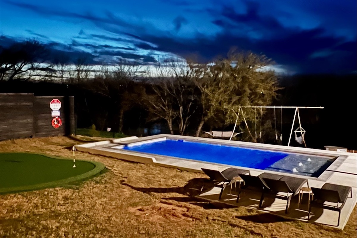 Evening swim in the illuminated pool at Noir.