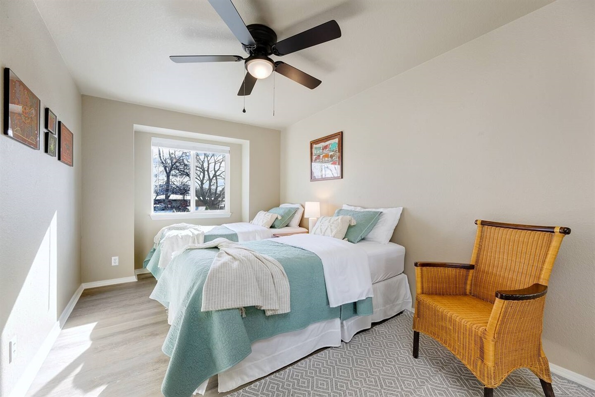 2 twin beds.  Upstairs bedroom.  Connecting full bathroom which adjoins with other upstairs bedroom.  There is a sleeping mat which can be placed on floor for extra sleeping space. 