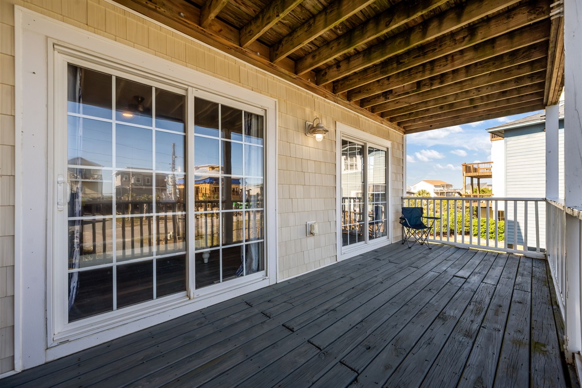 Slide into serenity on the shared balcony of North and South Queen bedrooms!