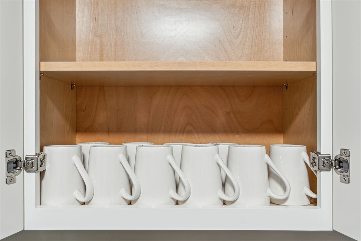 Enjoy a fully equipped kitchen featuring a dishwasher, oven, stove, microwave, sink, toaster, and coffee maker. It also comes stocked with glasses, cooking utensils, pots, pans, spoons, forks, and everything you need to prepare your favorite meals.
