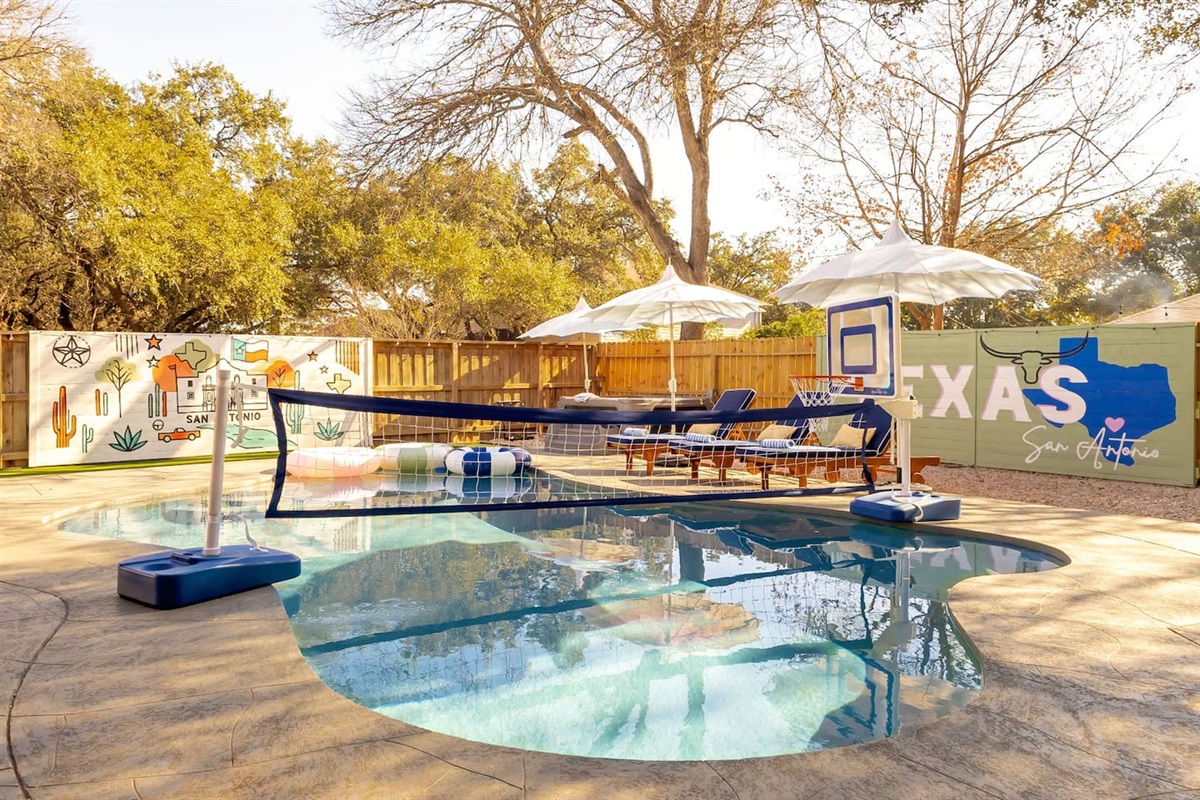 Soak up the Texas sunshine in this stylish, Insta-worthy pool paradise—complete with games, loungers, and a custom mural for the ultimate group getaway vibe
