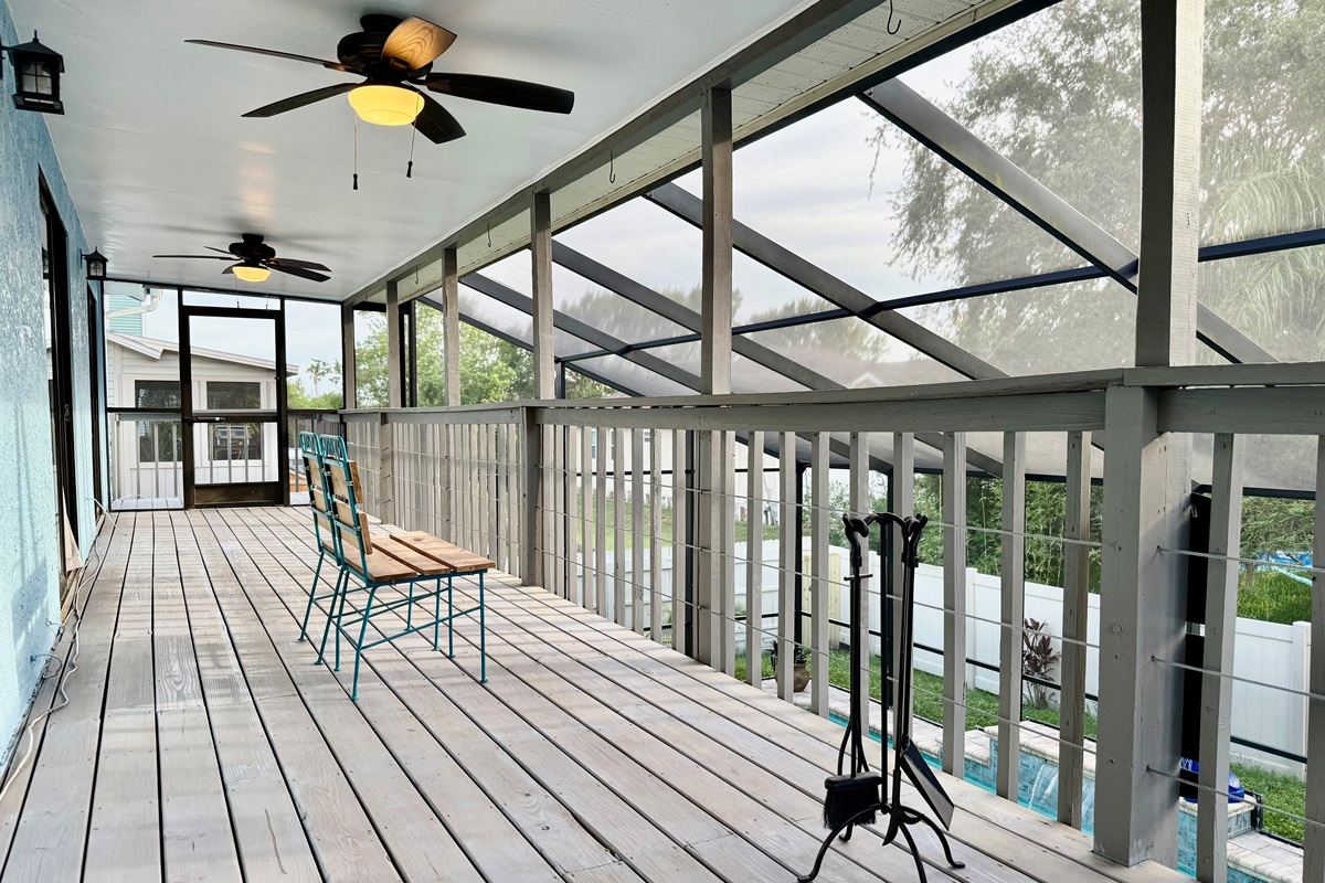 Two overhead ceiling fans ensure a cool, breezy ambiance throughout the day — whether you're lounging in the sun or enjoying a shaded afternoon escape.