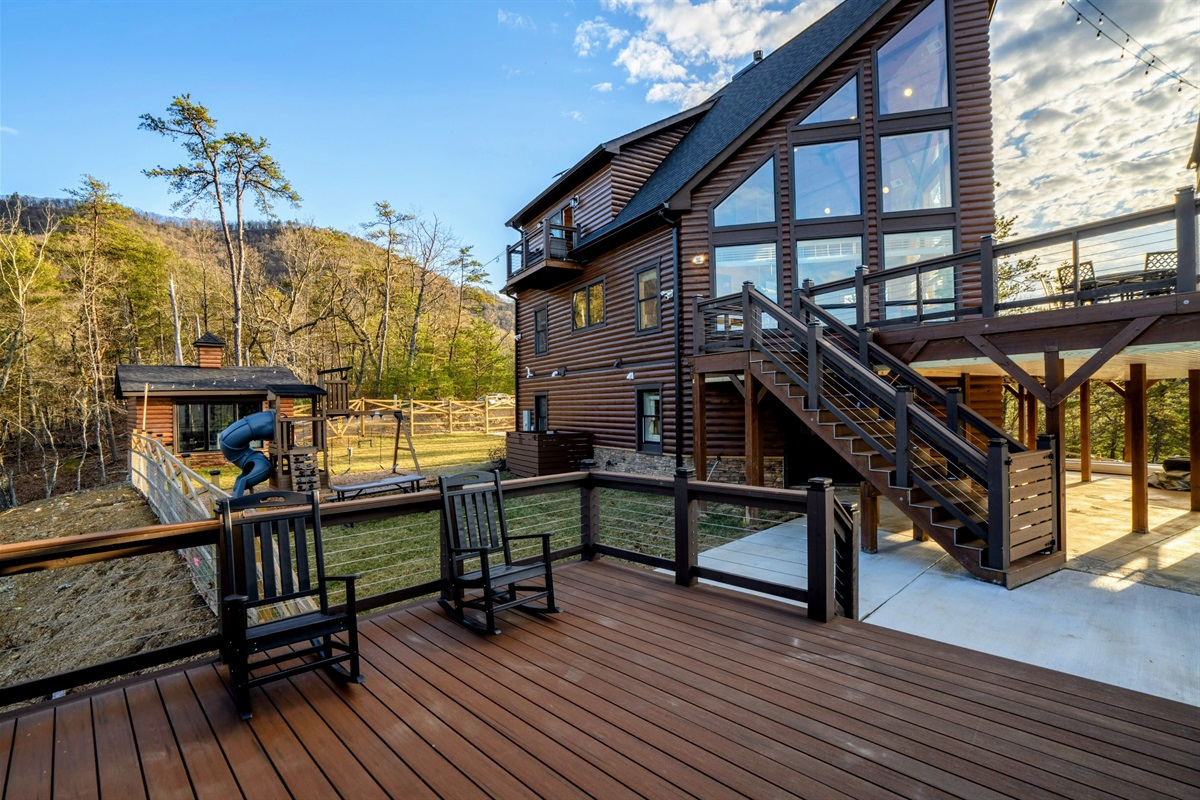 Joy Around Every Corner – Safe, scenic, and made for fun, this fenced yard and playset are ready for unforgettable family memories.