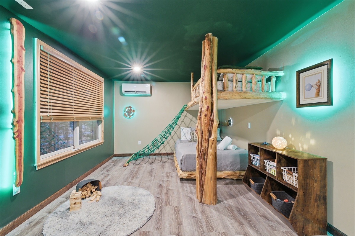 Climb the net to reach the cozy sleeping nook