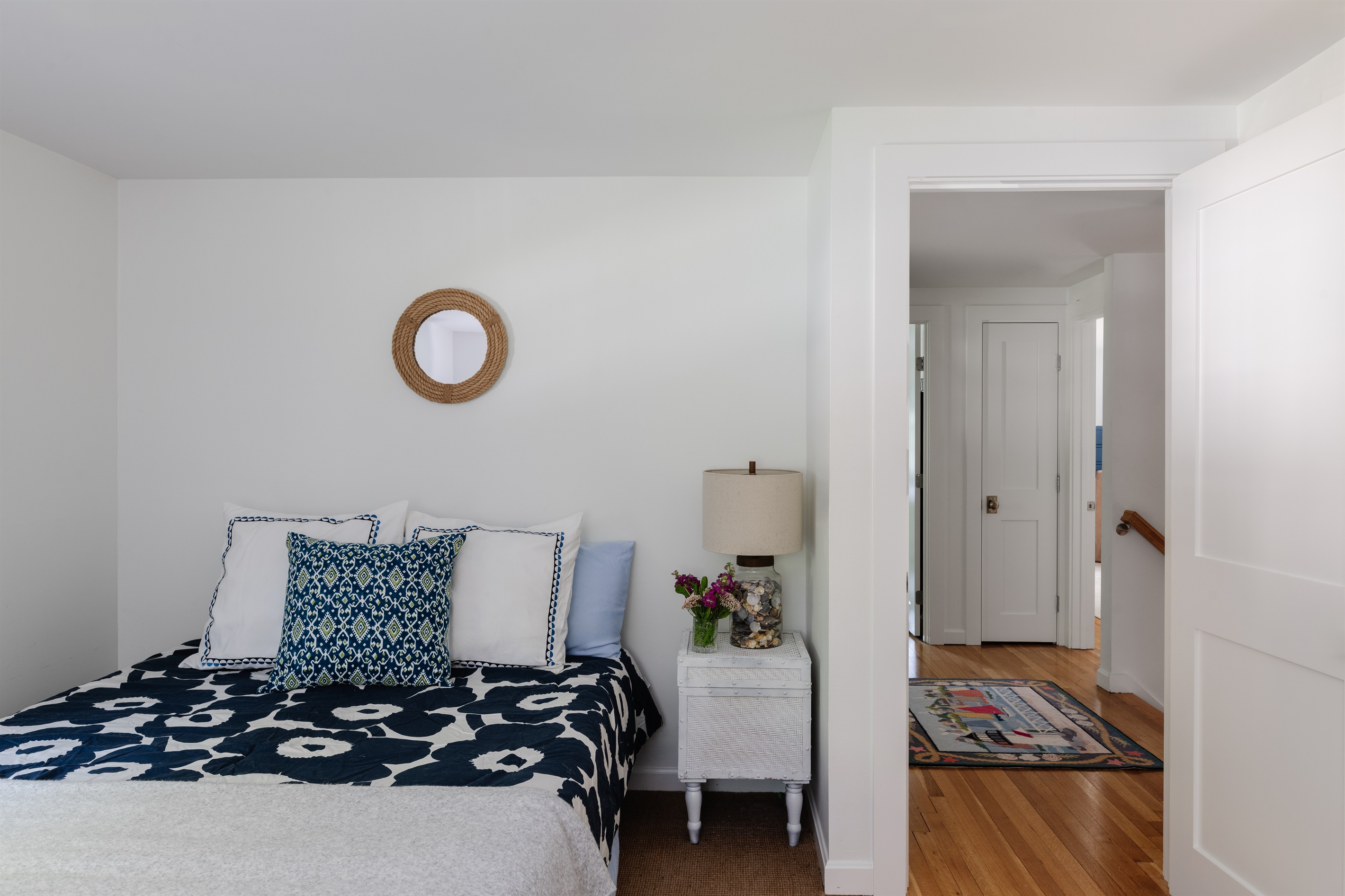 Spacious third bedroom with a queen bed, perfect for  additional guests.